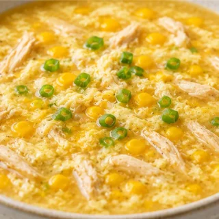 Golden Chicken & Corn Soup - chicken corn soup - Chicken corn soup: Make this comforting Chinese-style soup in under 20 minutes. Easy recipe with tender chicken