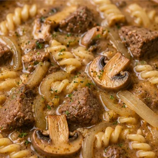 Beef Stroganoff Soup: Cozy Comfort - Beef Stroganoff: craft this hearty, comforting soup with tender beef, mushrooms, and creamy pasta. Perfect for a satisfying