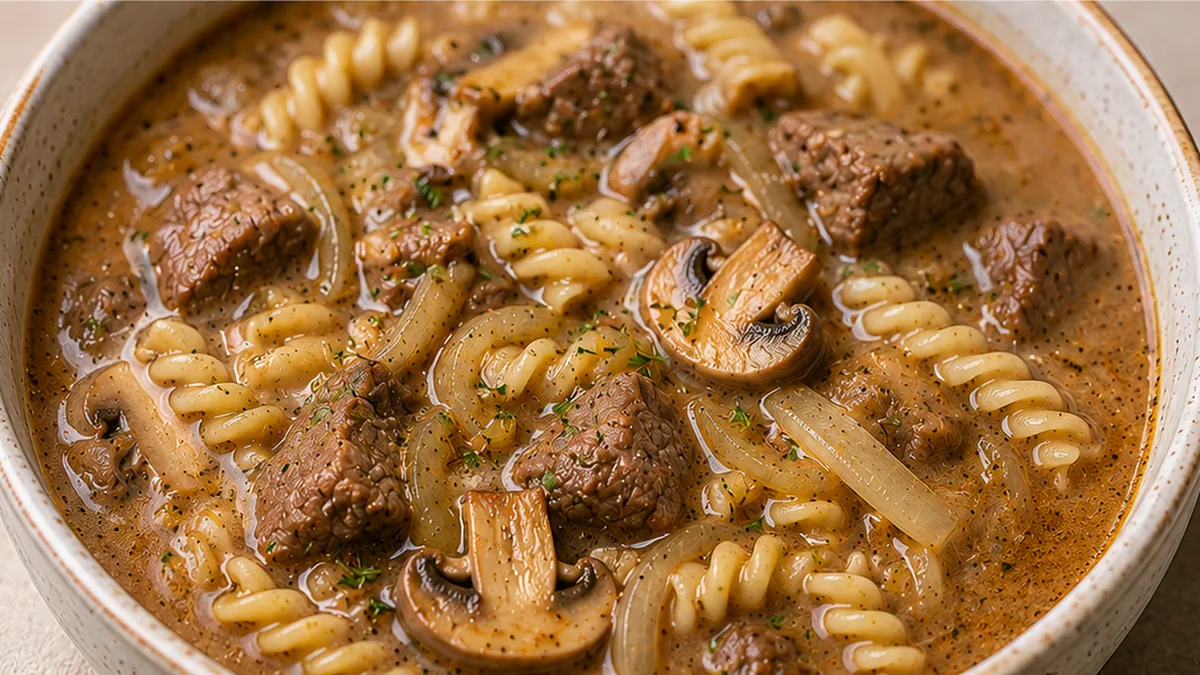 Beef Stroganoff Soup: Cozy Comfort - Beef Stroganoff: craft this hearty, comforting soup with tender beef, mushrooms, and creamy pasta. Perfect for a satisfying