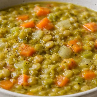 Cozy Slow Cooker Split Pea Soup - Split pea soup: master this comforting and nutritious slow cooker recipe. Packed with vegetables and flavor, it's perfect for