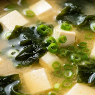 Easy Miso Soup Recipe - Miso soup: Make this incredibly easy Japanese comfort soup in under 15 minutes with simple ingredients like dashi, wakame, and tofu. Per