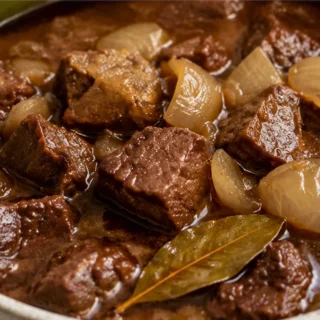 Melt-in-Your-Mouth Paleo Beef Stew - Paleo Beef Stew: savor this tender, flavorful slow cooker recipe. Master rich flavors with coconut aminos for a healthy, sa
