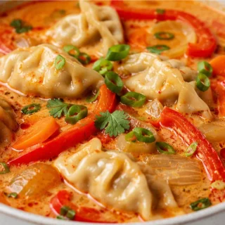 Thai Red Curry Potsticker Soup - Potsticker soup: craft this vibrant Thai Red Curry Potsticker Soup in under 30 minutes. A comforting, flavorful, and easy weekn