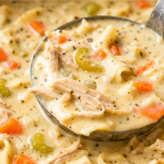 Creamy Chicken Noodle Soup - Whip up the best creamy chicken noodle soup for ultimate comfort! This easy homemade recipe features tender chicken, veggies, and n